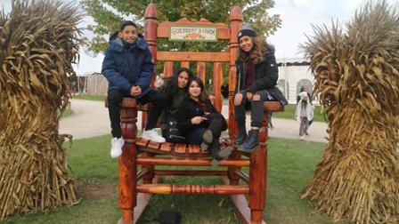 Silvia Astudillo with her family at the pumpkin patch