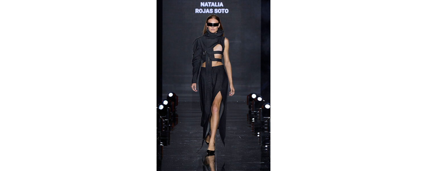 Model wearing a Harper College Fashion Studies student design on the runway at the Fashion & Talents show in Rome.