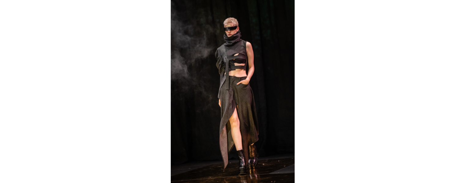 Model wearing a Harper College Fashion Studies student design on the runway at the Fashion & Talents show in Rome.