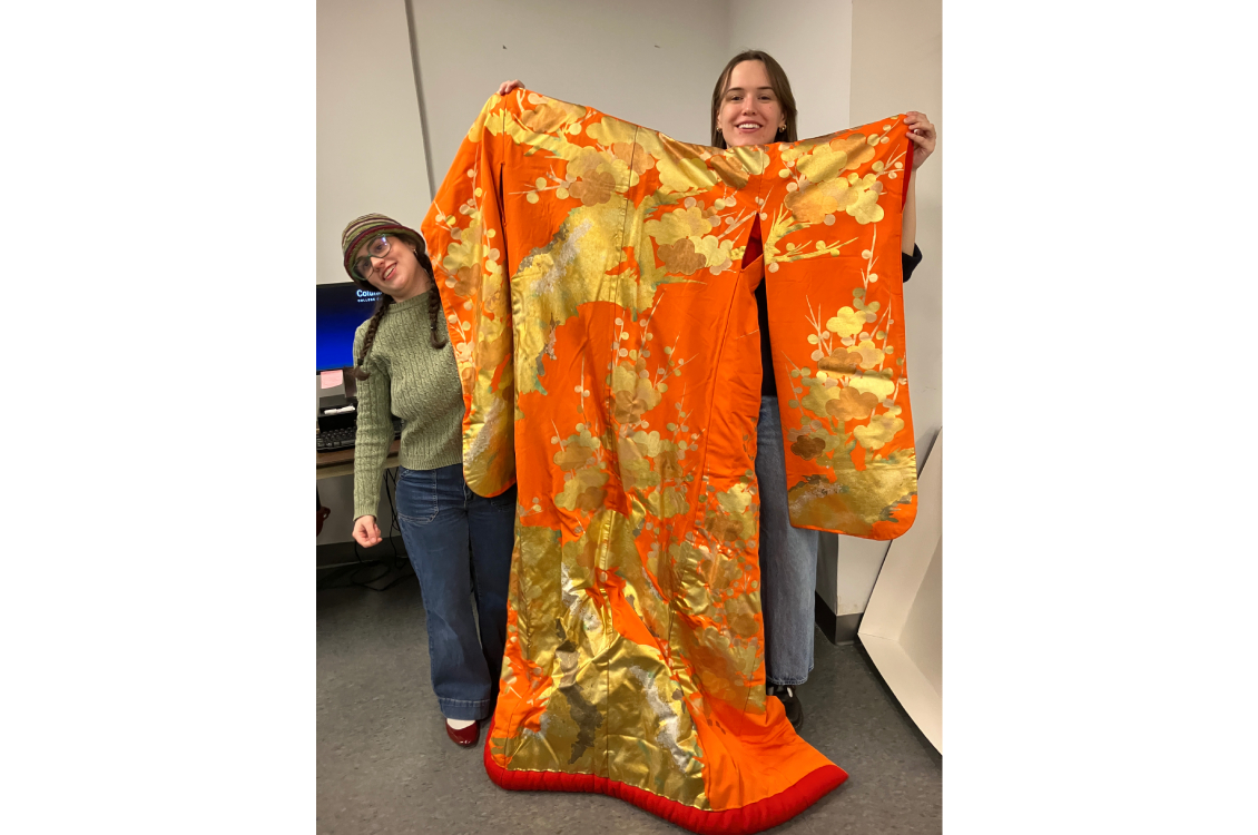 Stunning orange and gold hand painted kimono from Japan.