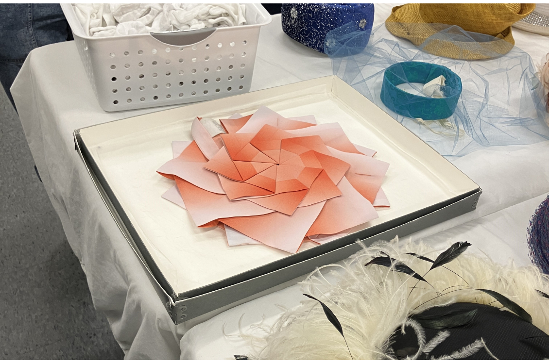 This flat spiral of pink geometric triangles is actually a blouse by the famous designer Izzy Miyaki.