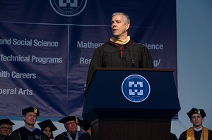 Arne Duncan speaks at graduation
