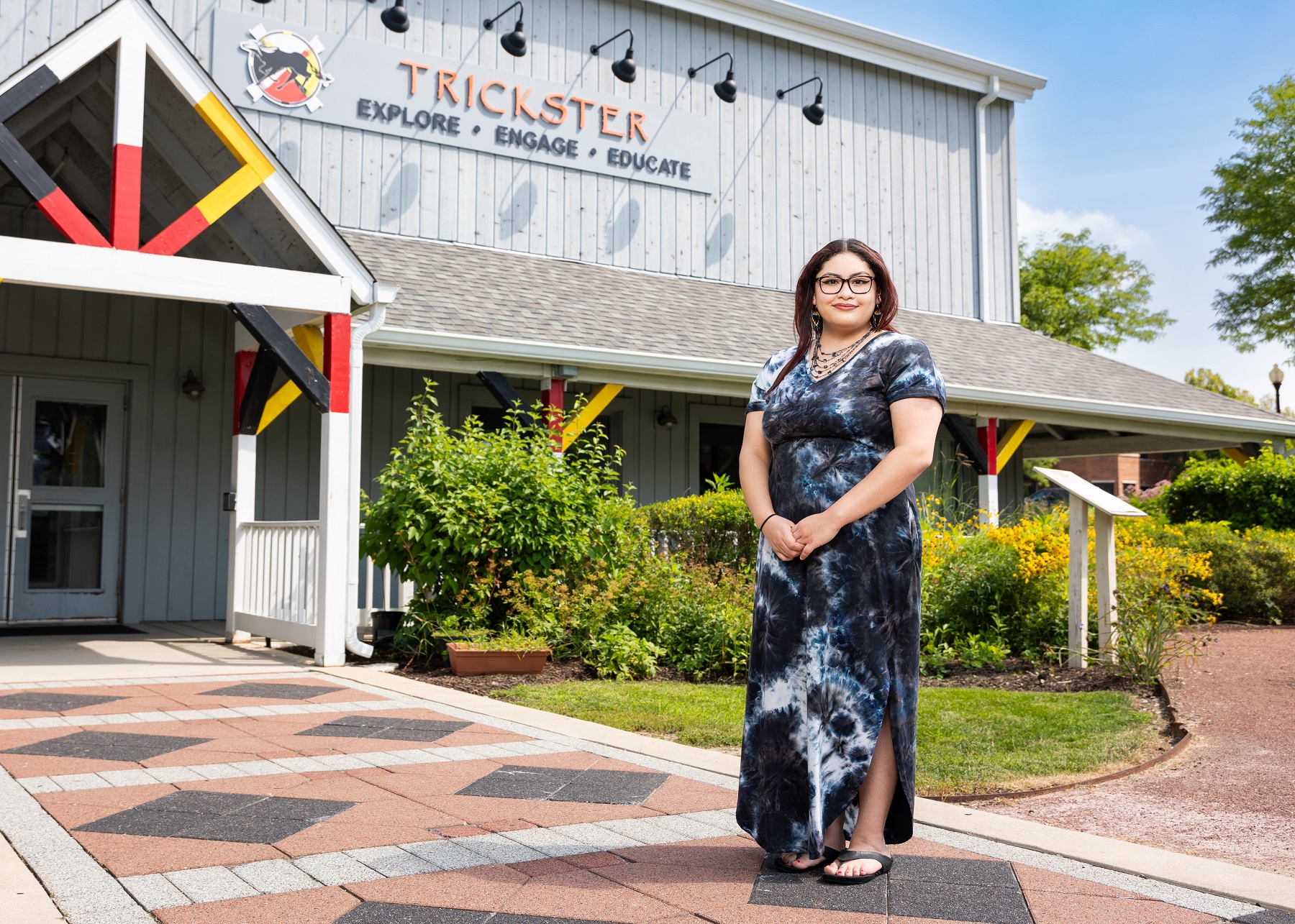 Ada Velazquez, Harper's first Social Justice Studies Distinction graduate, stands outside the Trickster Cultural Center in Schaumburg.