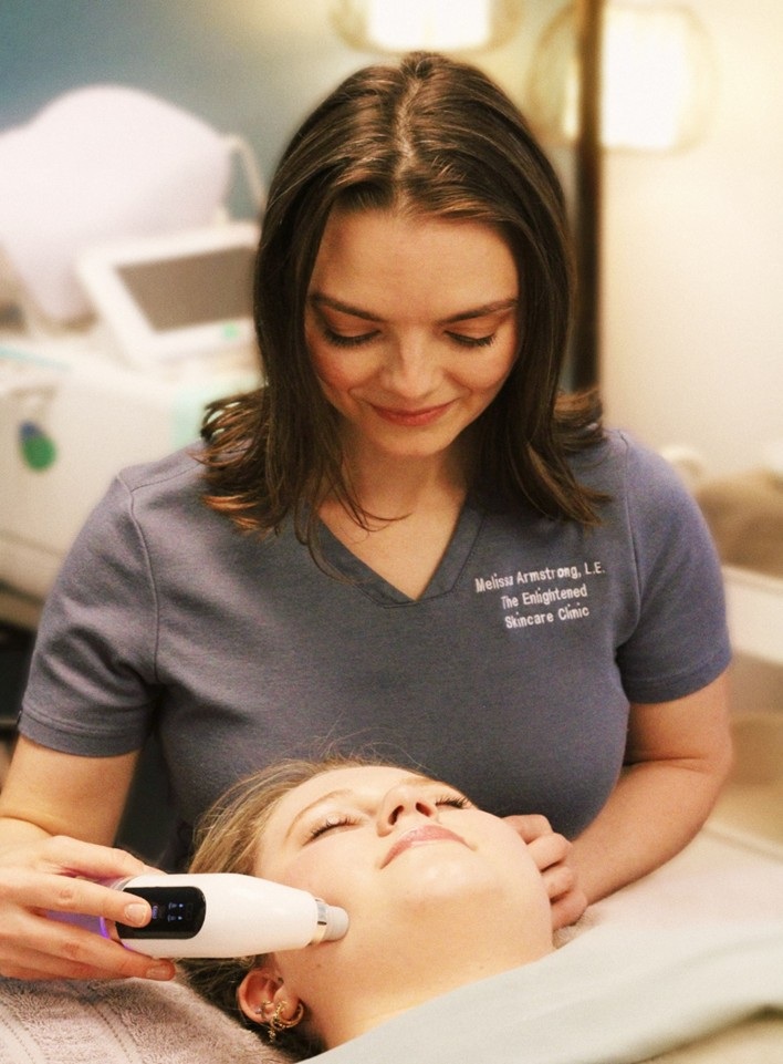 Melissa Armstrong works on a client in her clinic