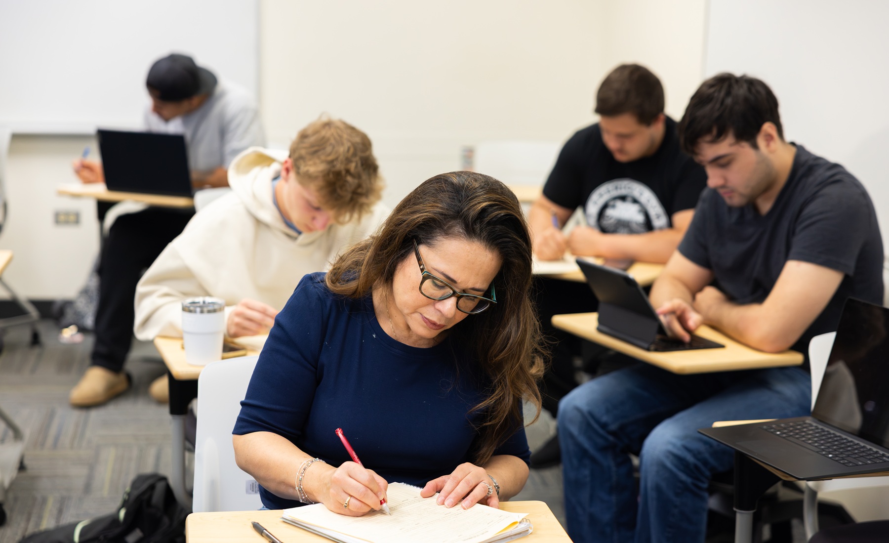 CMA Certification Students work on coursework during an Accounting class at Harper