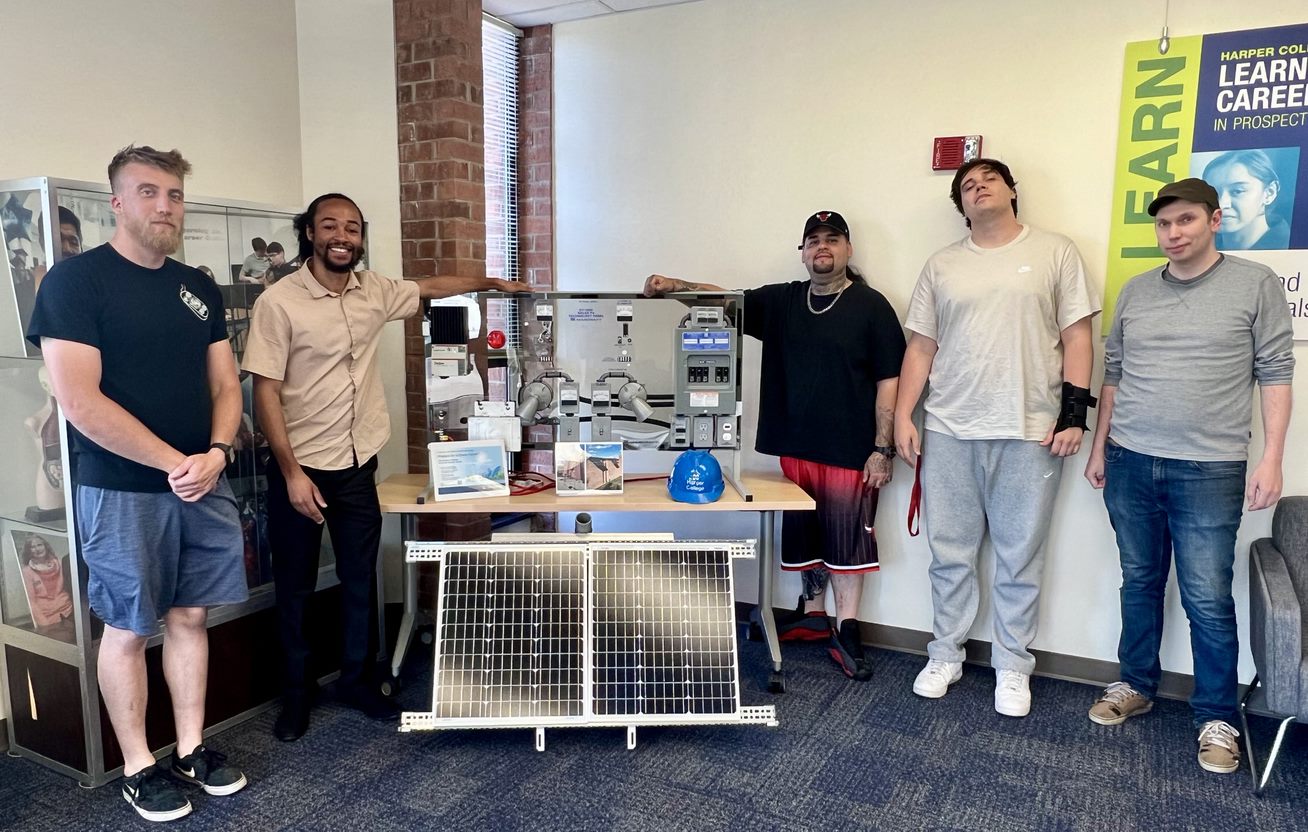 CPE students explore renewable energy using a solar demo unit at the Learning and Career Center in Prospect Heights.