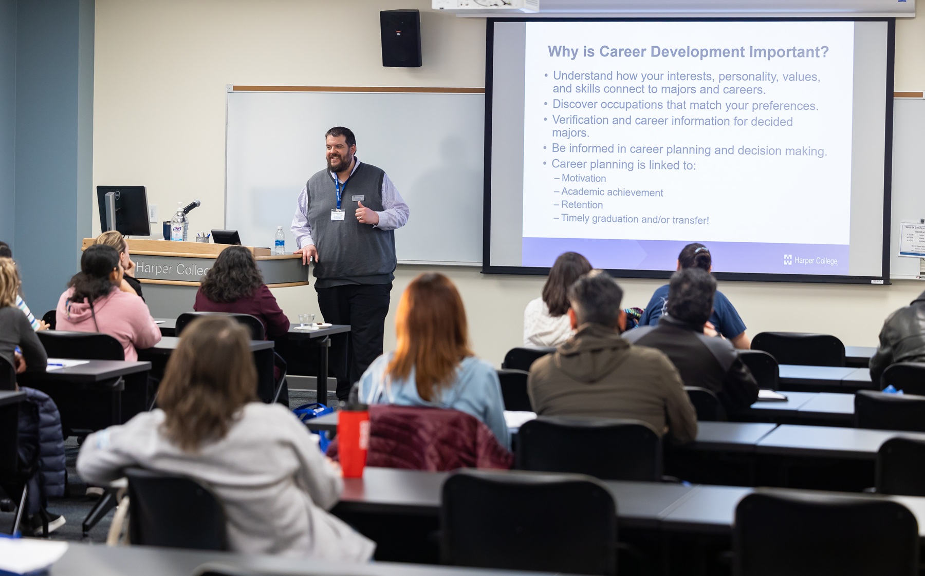 Career Forward attendees listen to a presentation about career development
