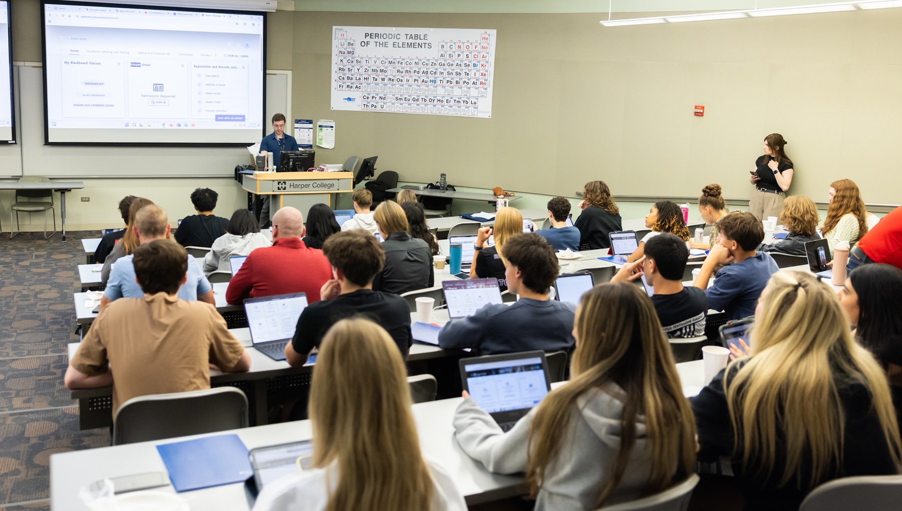 Students sit in a Harper College classroom for College Now orientation