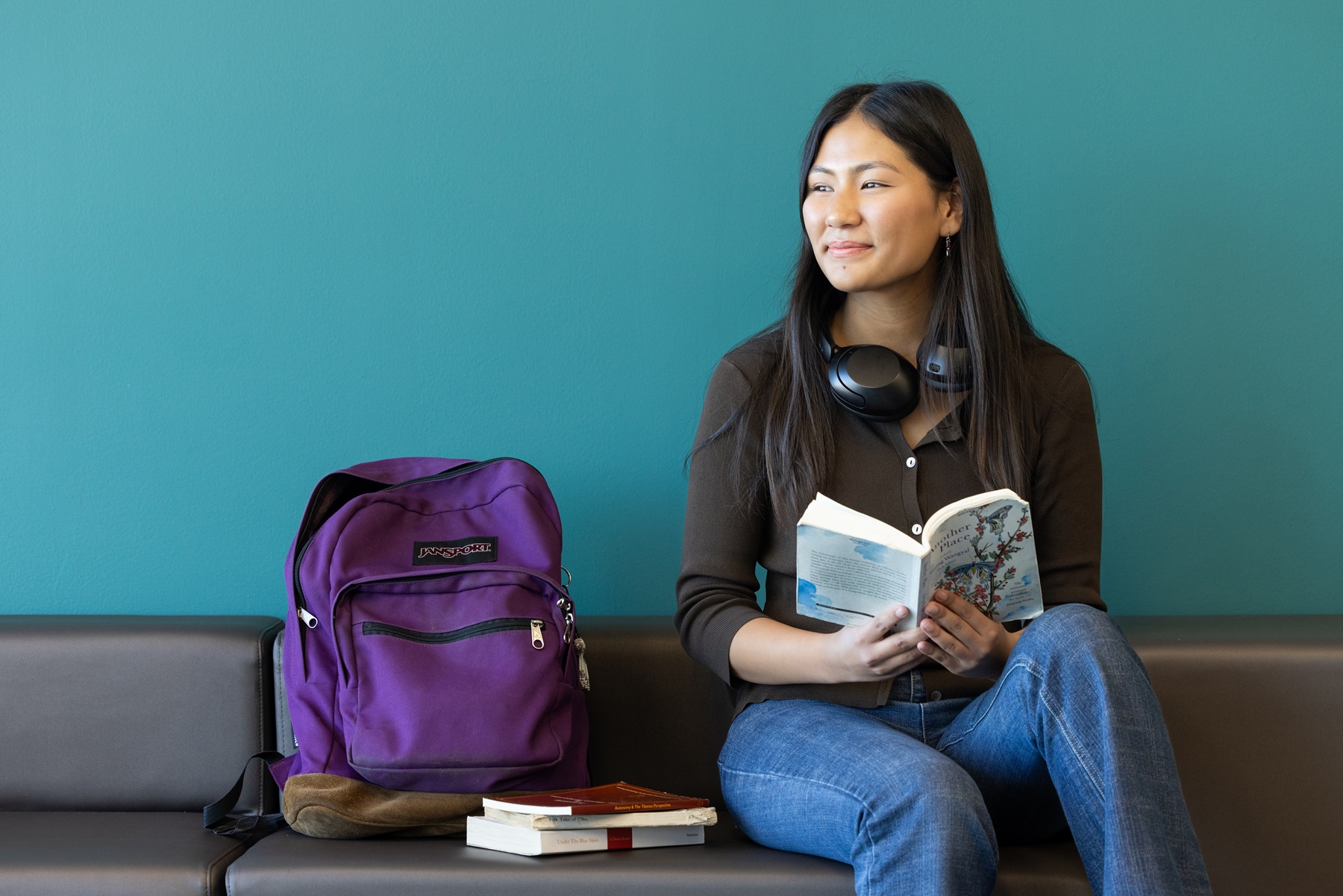 Dechen Atsatsang sits in the Harper College Library