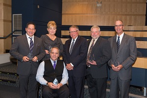 Group photo of Harper College's 2018 Distinguished Alumni honorees and President Ken Ender