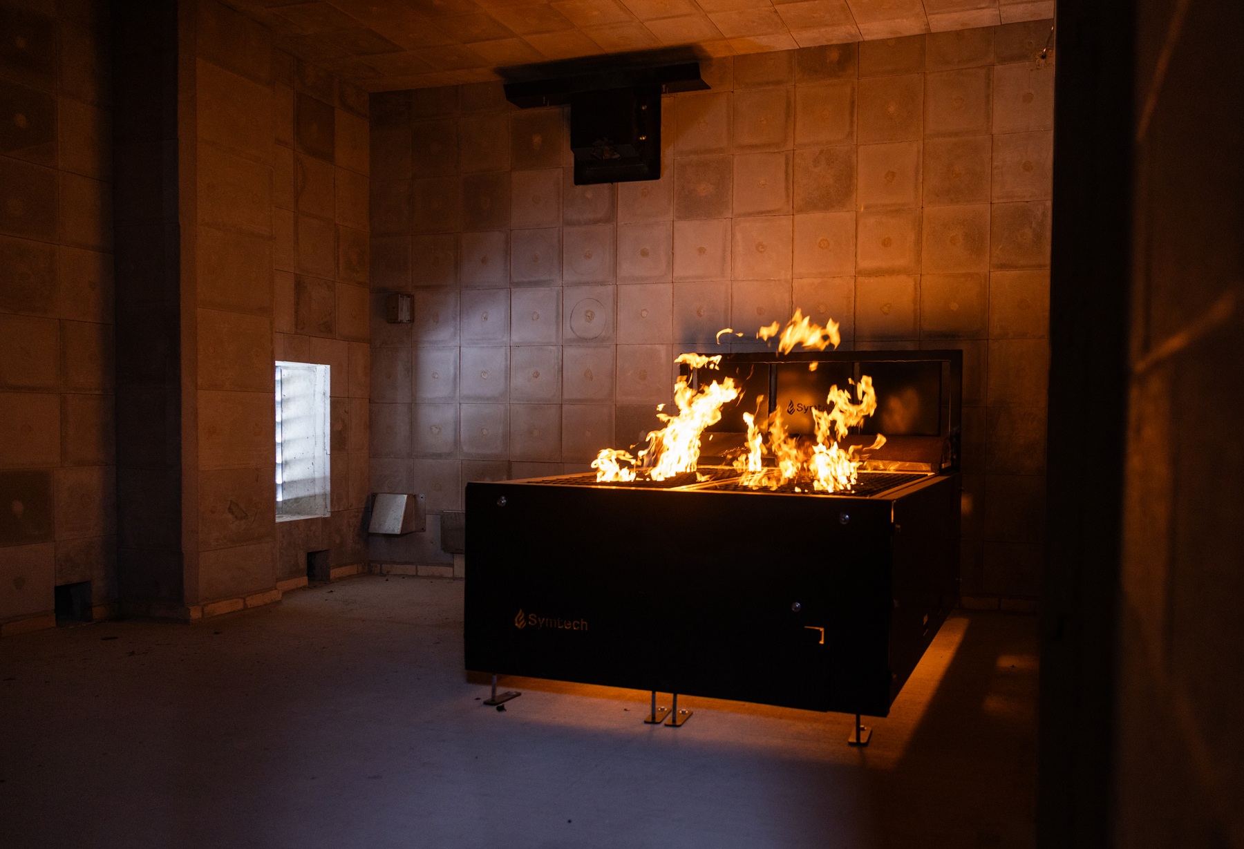 A simulation bed prop burns in Harper's Emergency Services Training Center.