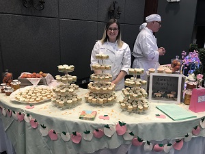 Emily Reddy and her cupcake display