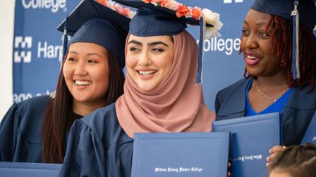 Harper 2021 graduates hold diplomas
