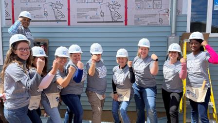 Harper women at a Habitat for Humanity house
