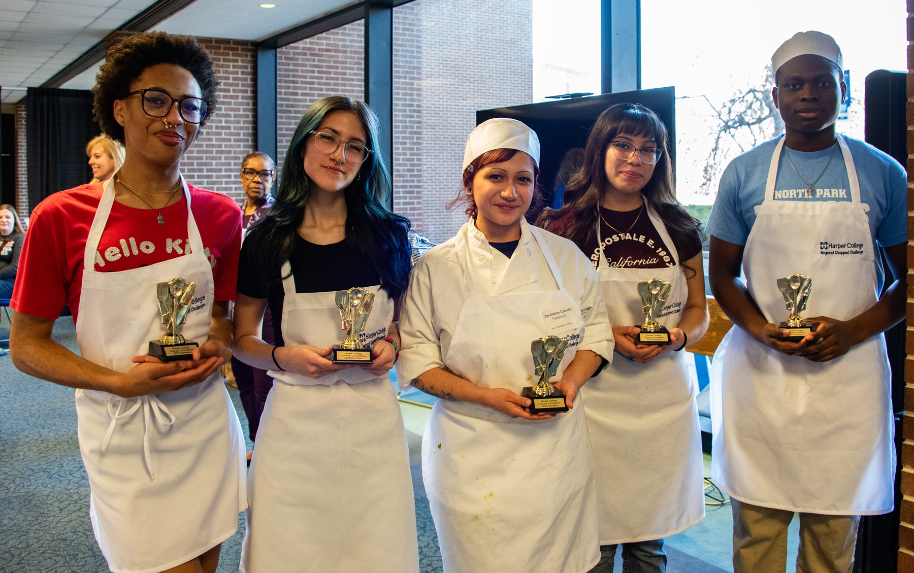 Students from Palatine High School won the District 211 title at the Harper College Culinary Competition