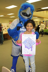 Ambassador School student with Harper Hawk