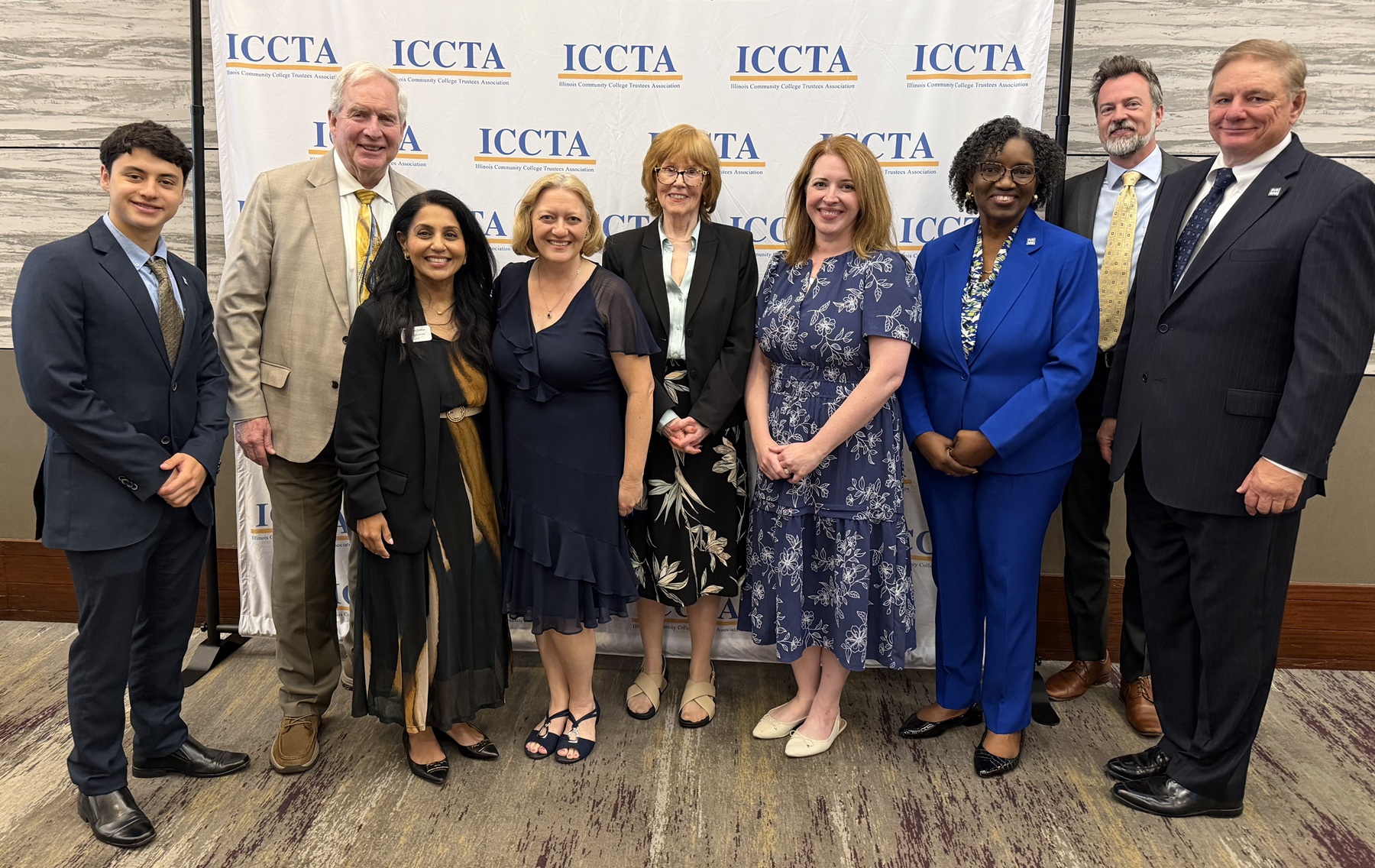 Harper College board members, faculty and staff stand for a photo at the ICCTA Awards Ceremony