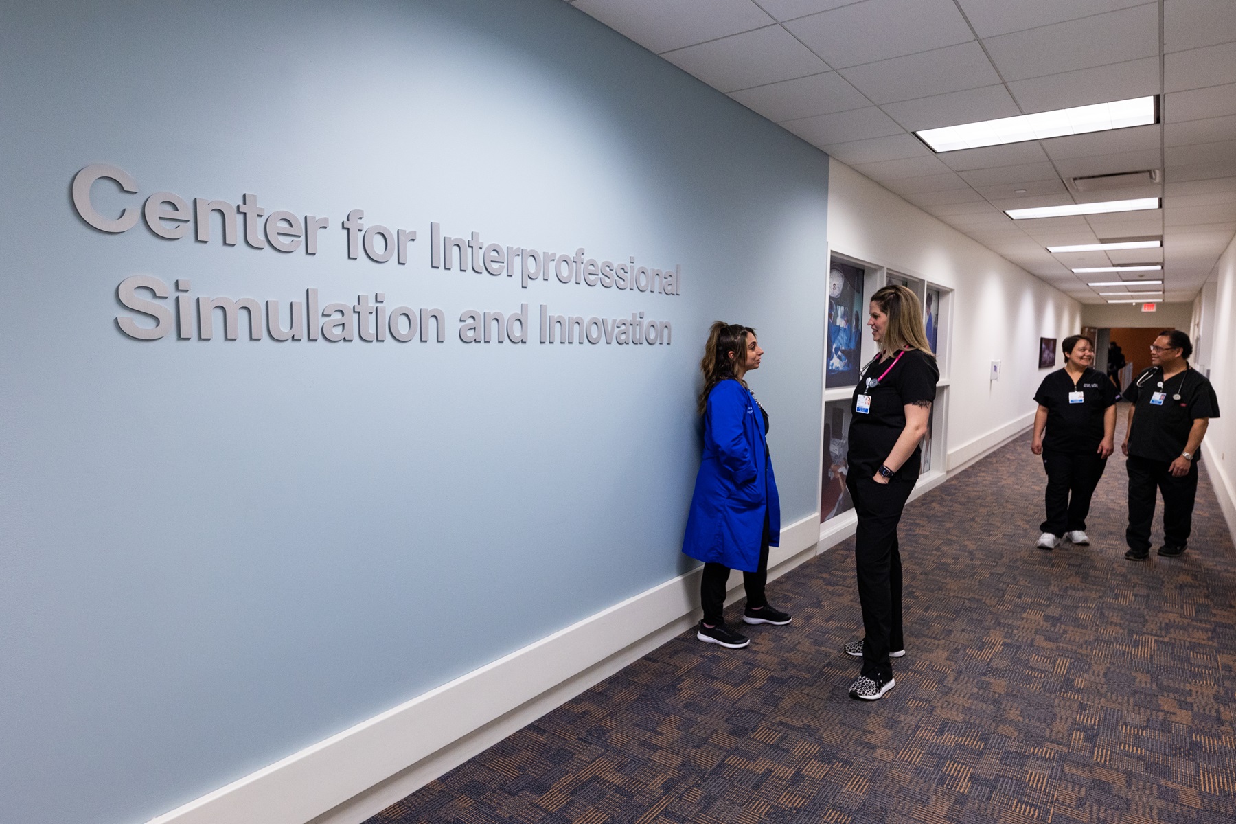 Health careers students interact in the Center for Interprofessional Simulation and Innovation