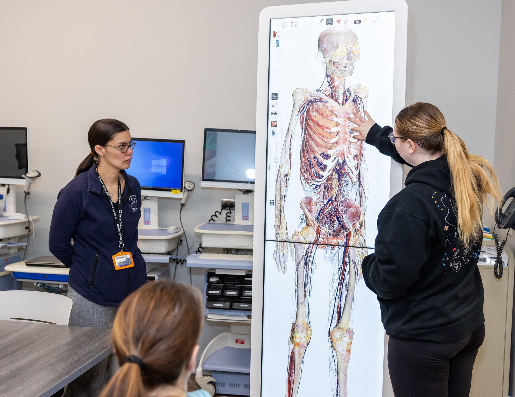 Students and instructors interact with the Anatomage table