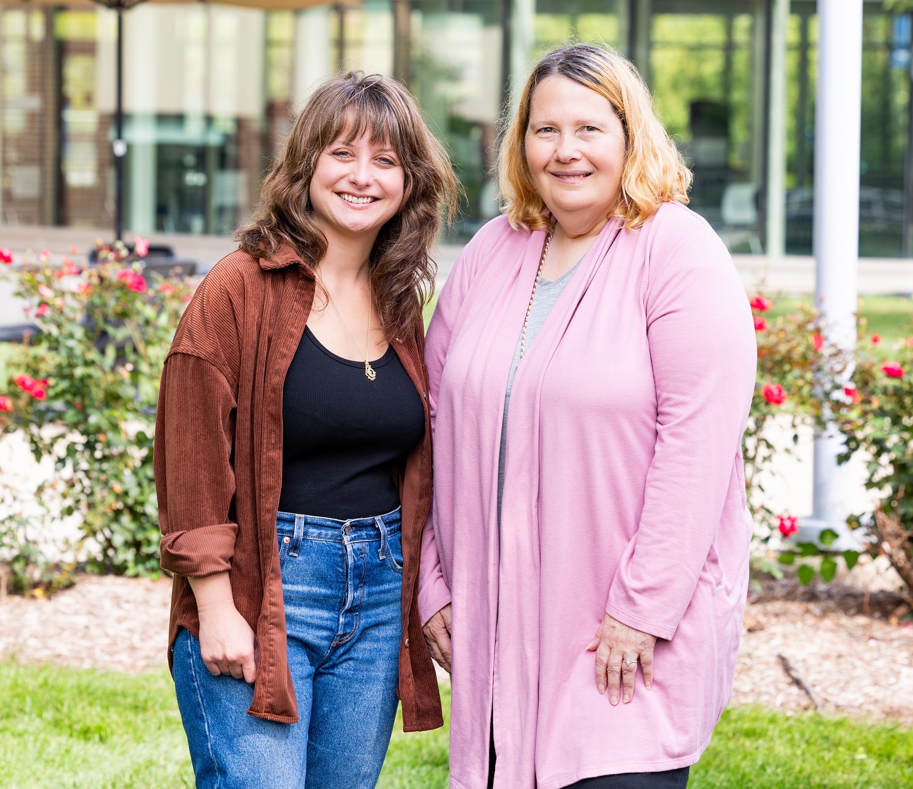 Harper student Kate Guerrero and faculty member Laura Ehrke stand on Harper's campus.