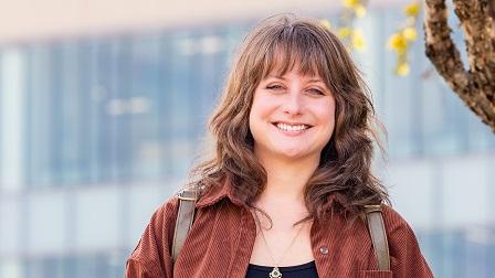 Contest winner and Harper student Kate Guerrero stands on campus.