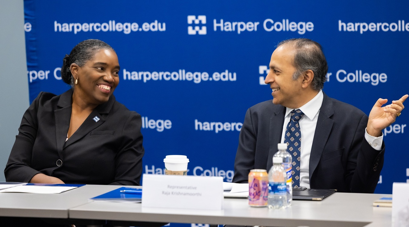 Dr. Avis Proctor and Rep. Raja Krishnamoorthi smile during an amusing exchange while speaking about quantum science