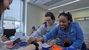 Students work in the Harper College Makerspace