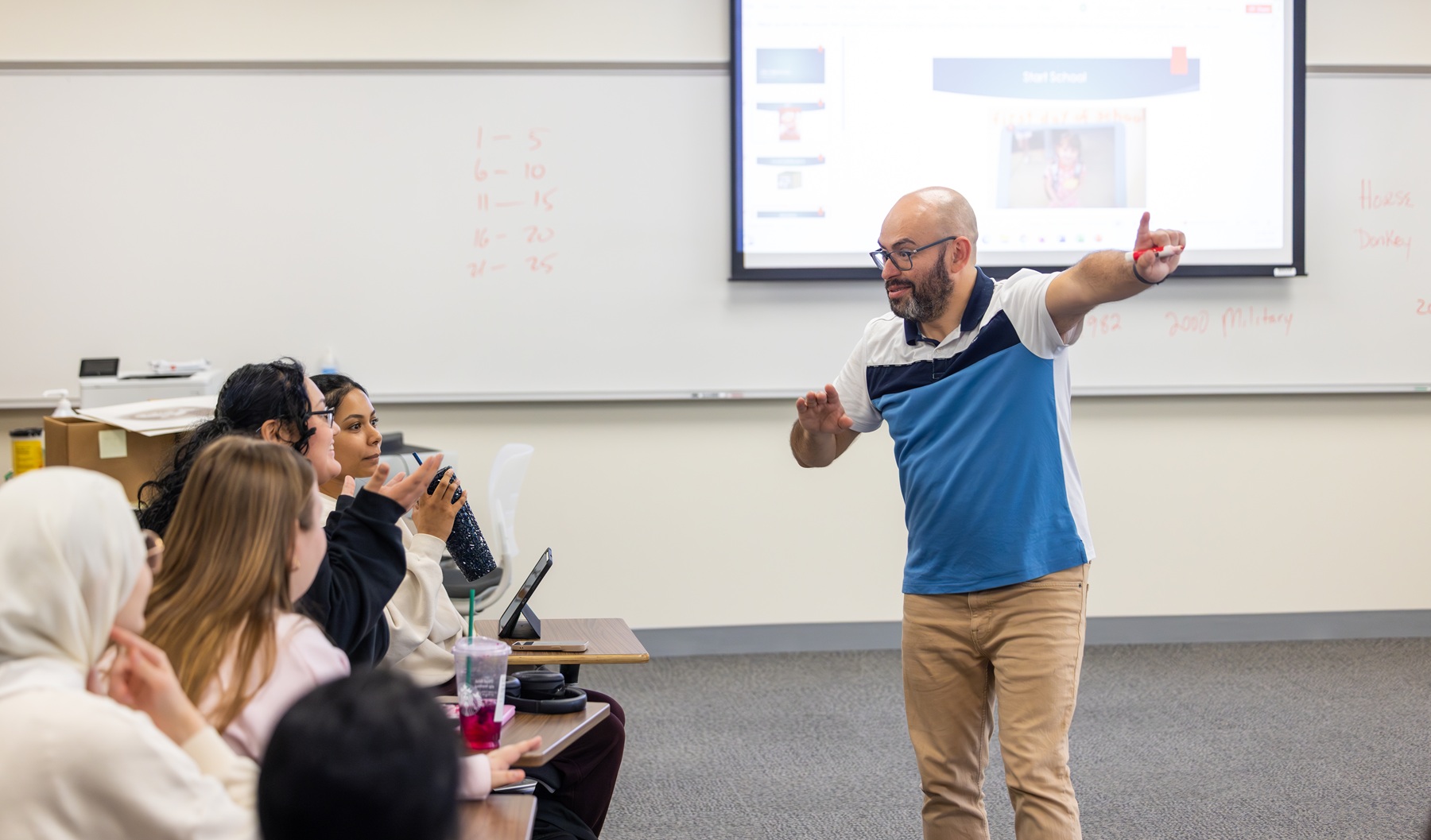 Marcos Aguilar teaches an ASL course