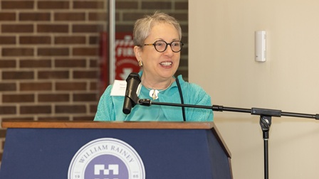 Martha Bell speaks at the dedication of the Martha Bell Gallery