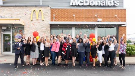 Bear Family McDonald's Restaurants and Harper College representatives celebrate their new partnership