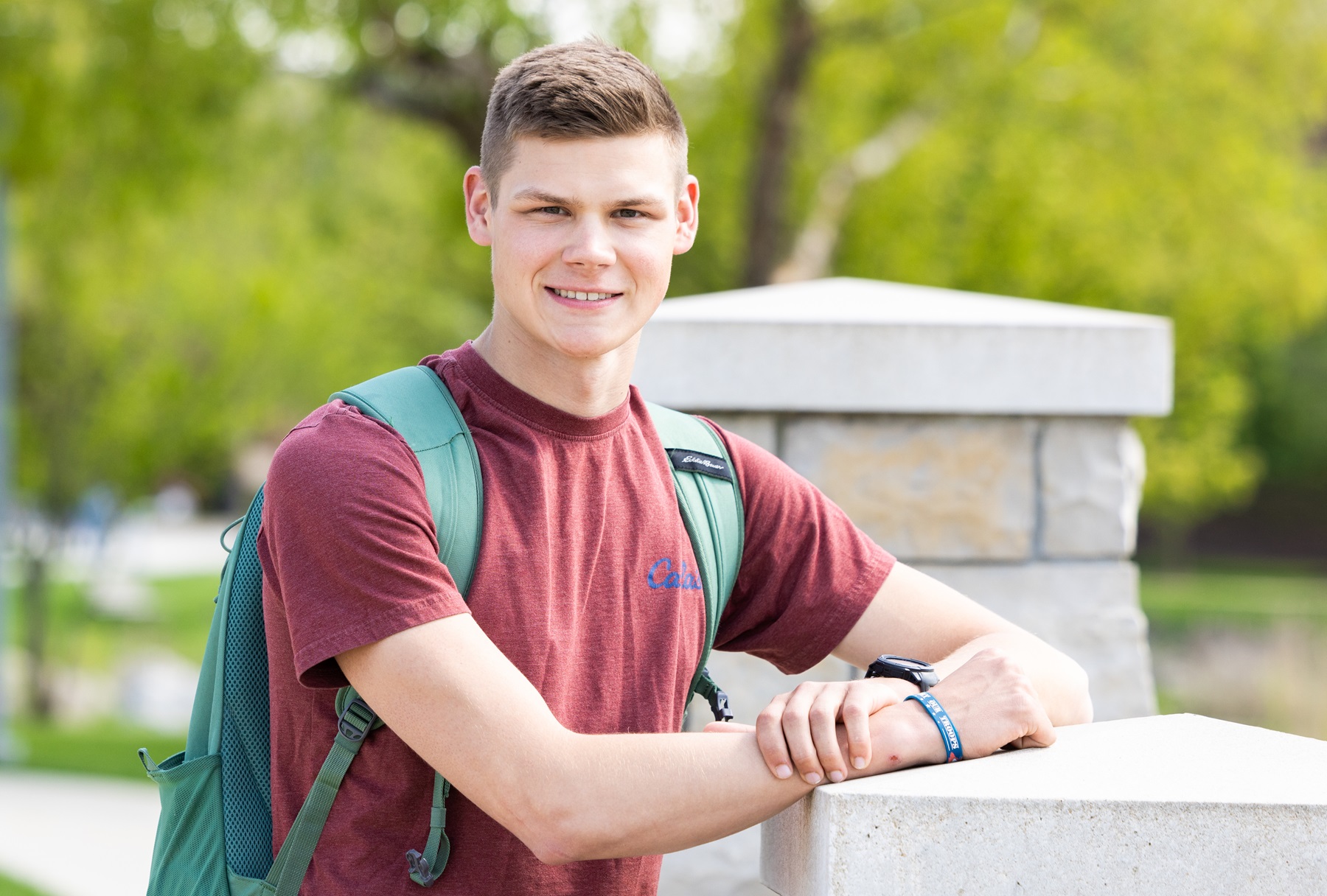 Nathan Johnson stands on the Harper College campus