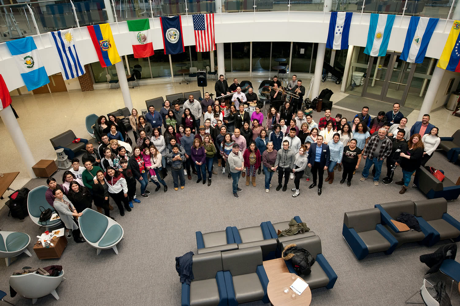 Attendees at a PASO event gather for a photo