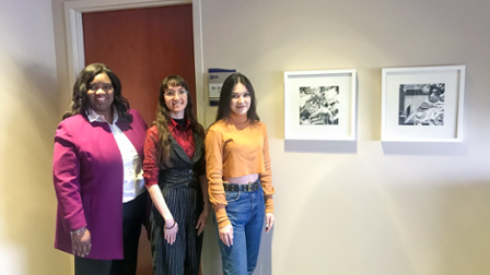Dr. Proctor, Stella Gurevich and Anhelina Karashevska stand next to the newly installed artwork