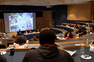 Attendees listen to a panel at the Print Expo