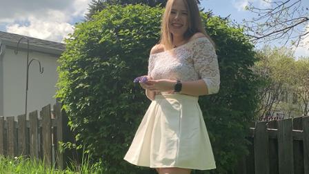 Sammi Sandefur stands in her yard