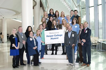 Harper alumni working at Advocate Good Shepherd Hospital gather at a Stand Up and Be Counted event