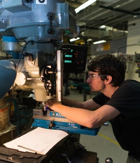 Student works in manufacturing lab