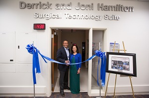 Derrick and Joni Hamilton cut the ribbon