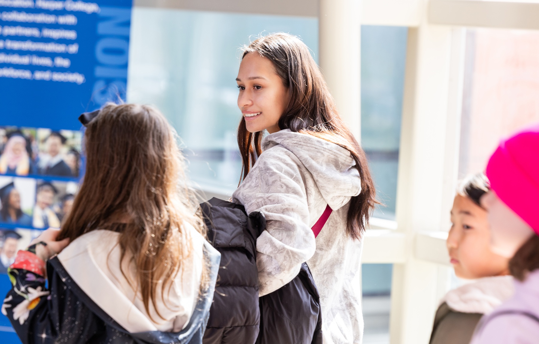 Harper student Ariana Alarcon leads a fourth-grade group on a tour of Harper's campus