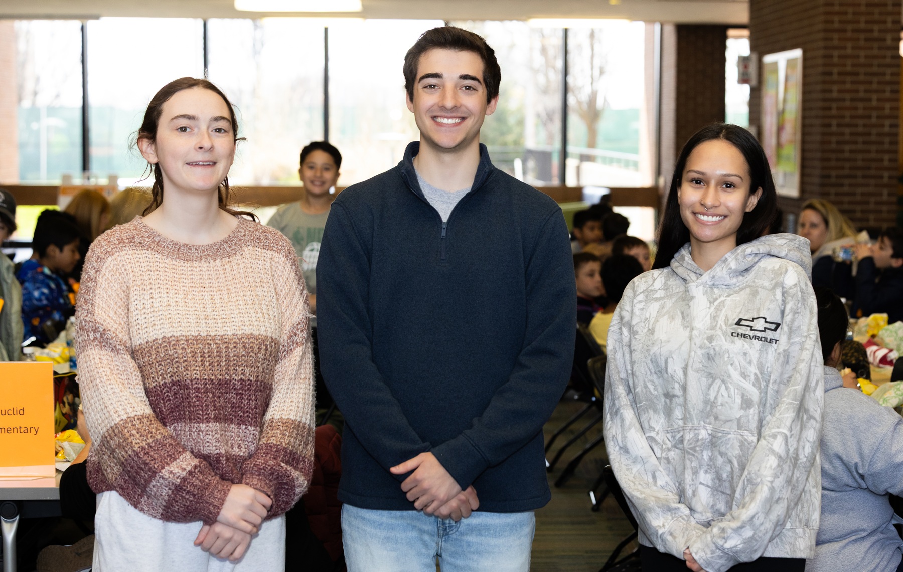 Harper students Kailey Sohn, Adin Rehberger and Ariana Alarcon pose in Building A