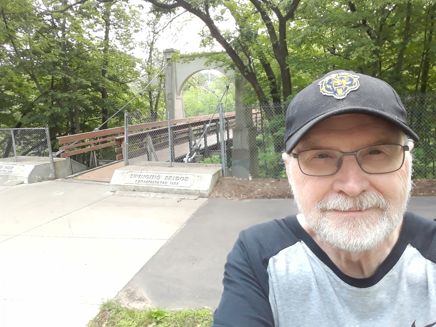 Author Trygve Thoreson outdoors near a bridge