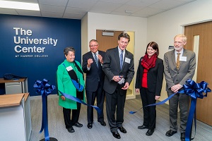 Greg Dowell cuts the ribbon at University Center dedication