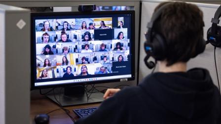 A Harper student interacts virtually with fellow college students from Mexico.