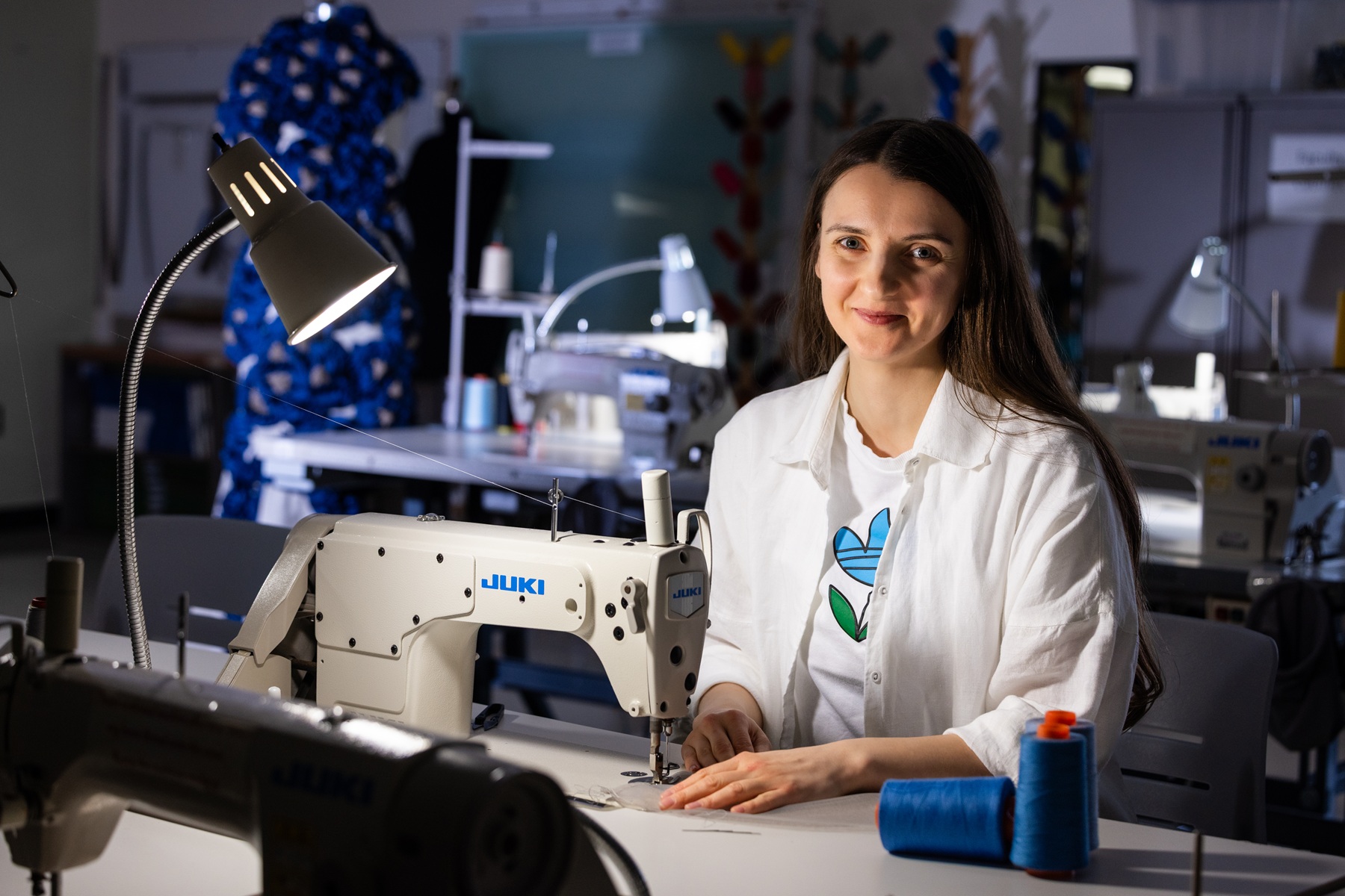 Katsiaryna Piatsevich sews in the Fashion Lab