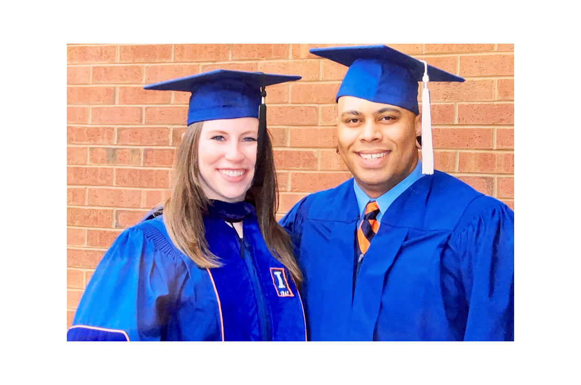 Harty and his wife smiling at undergrad graduation