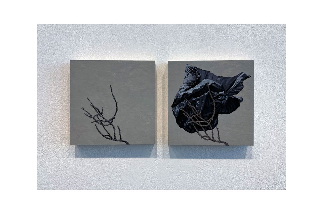 diptych in oil of a black plastic bag caught in a tree branch