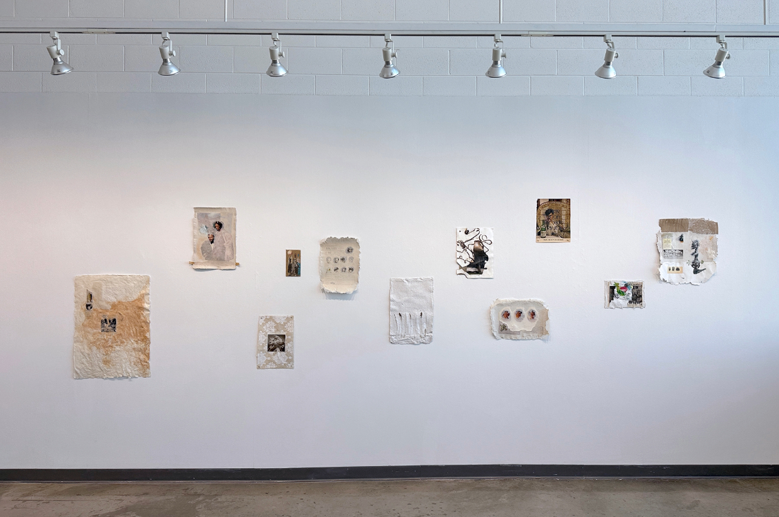 installation view of the exhibition space with artworks displayed on the wall