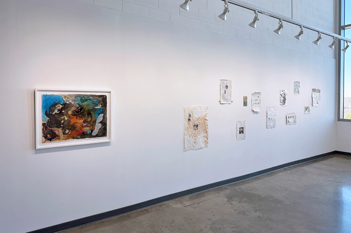installation view of the exhibition space with artworks displayed on the wall