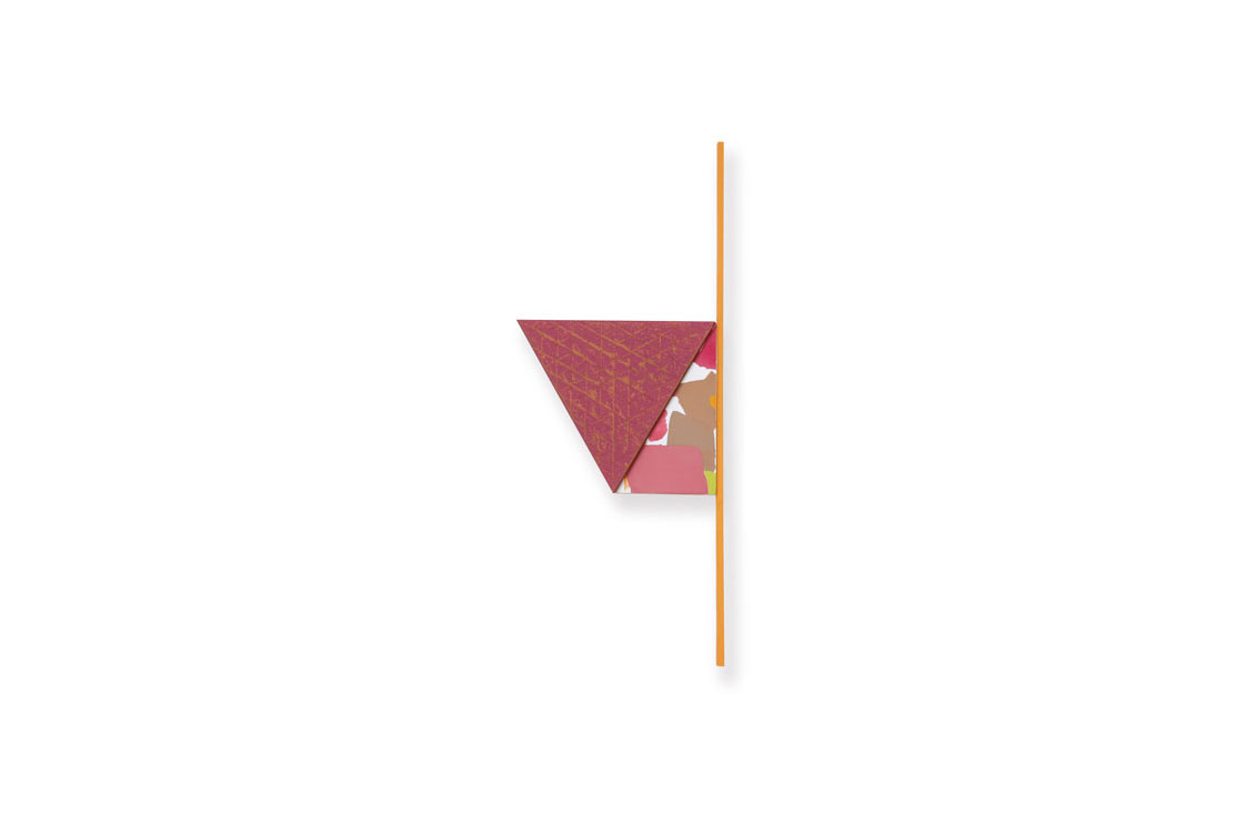 sculpture of a red flag on wooden pole