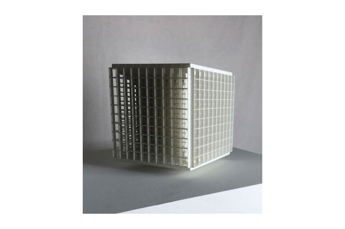 sculpture of an egg crate painted white
